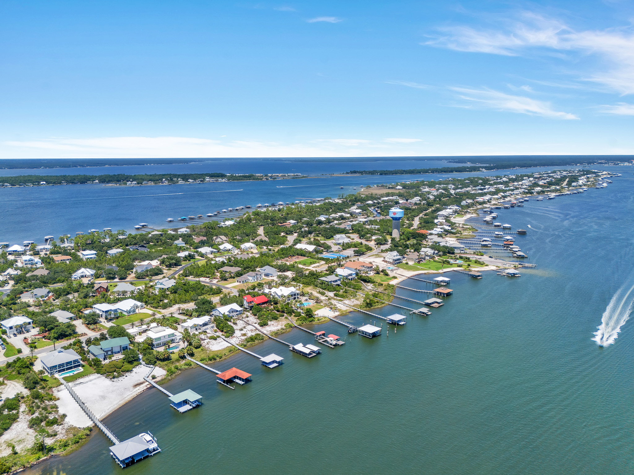 aerial drone shot of Ono Island showing a mix of canal lots and big water frontage.